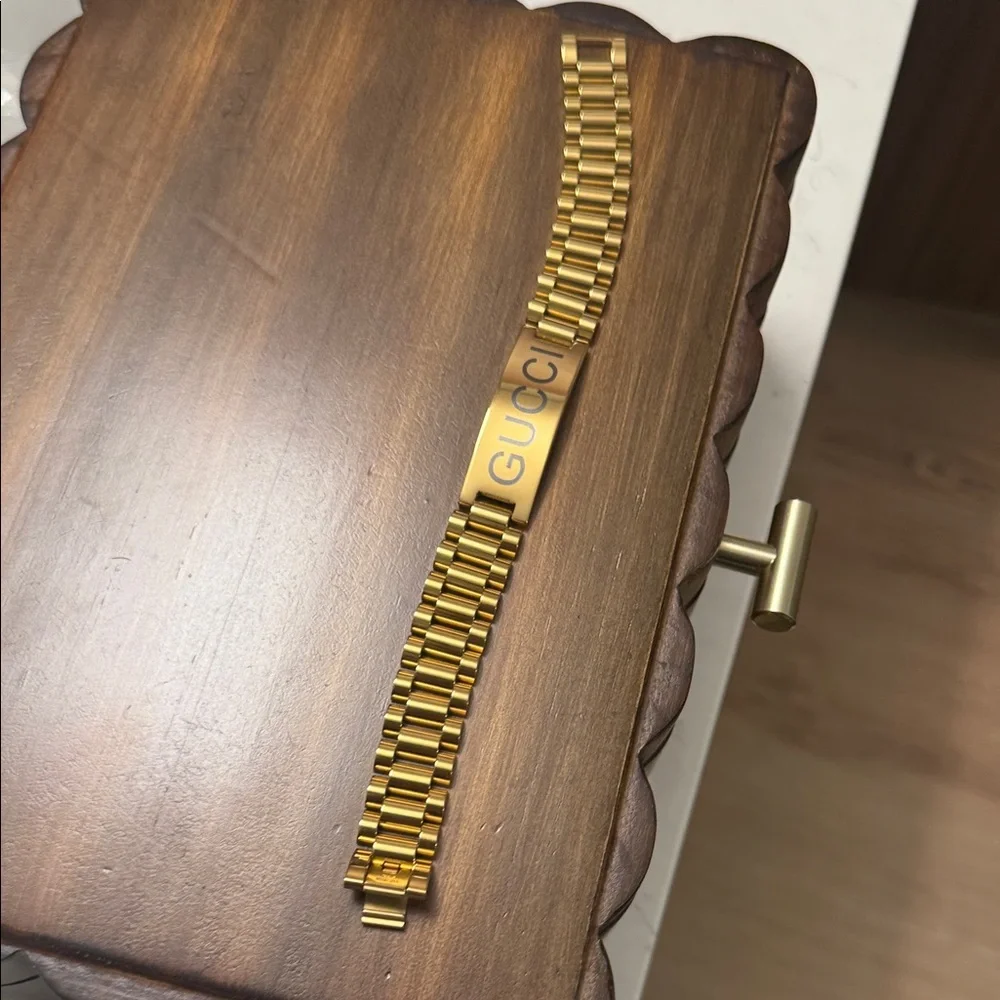 Gucci Gold Men's Bracelet with Black Lettering